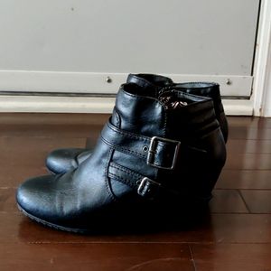 Call it spring booties with buckle straps embellishments
